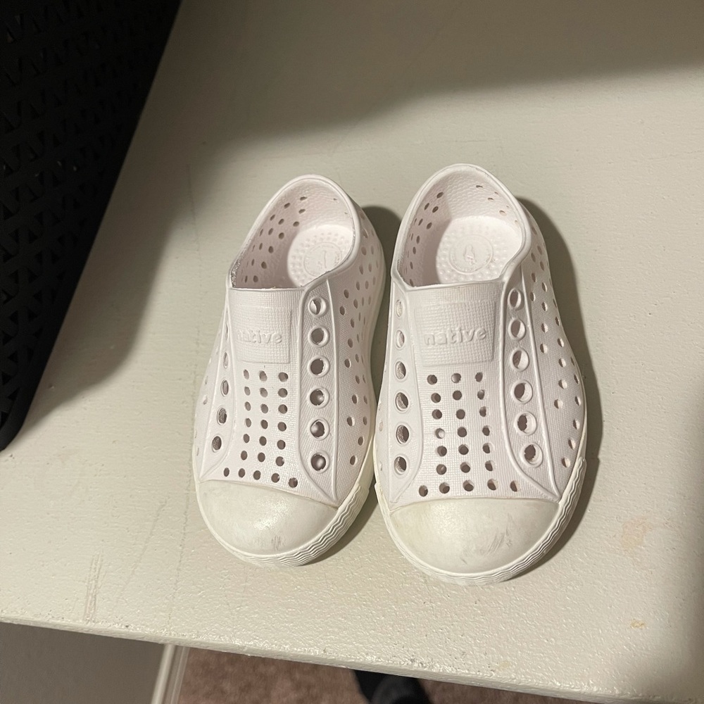 Native white baby shoe